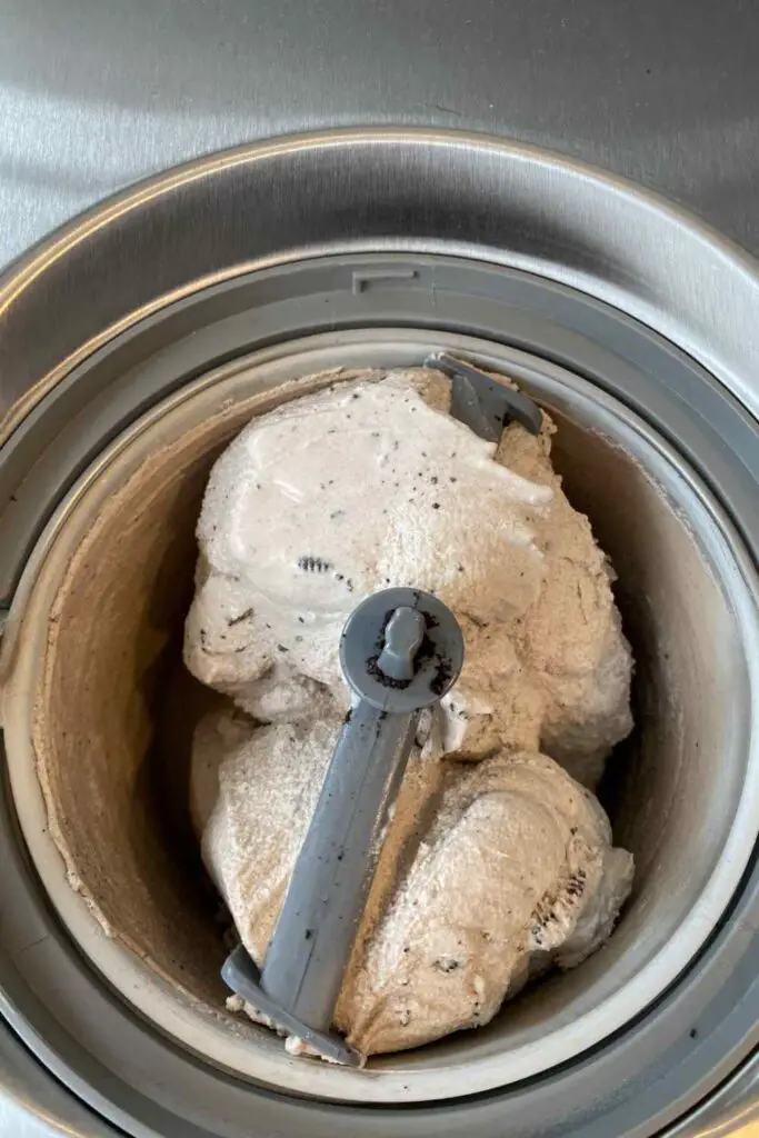 Smashing Oreos for Oreo Cookie Ice Cream in the machine