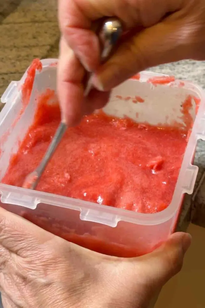 Using the fork to make the strawberry granita